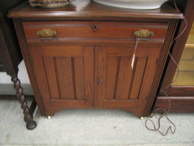 Appraisal: Victorian Washstand drawer over double doors