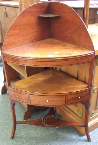 Appraisal: A Regency mahogany bowfront corner washstand cm wide