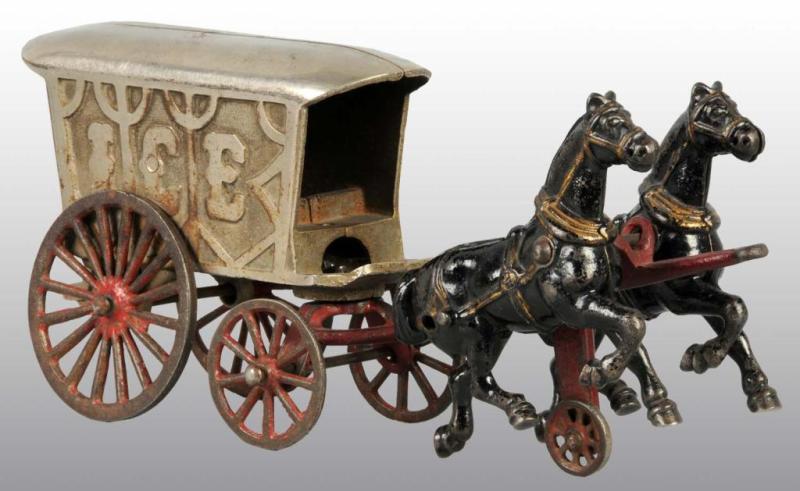 Appraisal: Cast Iron Dent -Horse Nickeled Ice Wagon Toy Description Pulled