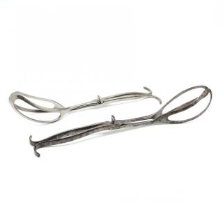 Appraisal: Two Pairs of Antique Steel Obstetrical Forceps both marked by