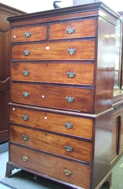 Appraisal: A George III mahogany secretaire chest on chest the upper