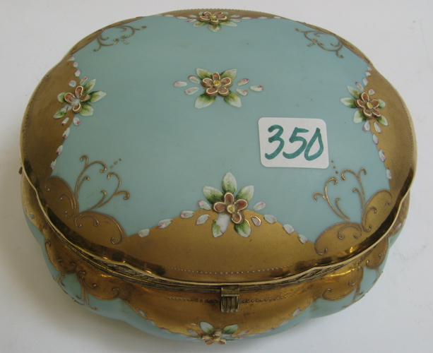 Appraisal: LADY'S PORCELAIN AND GOLD DRESSER BOX oval-shape with applied flowers