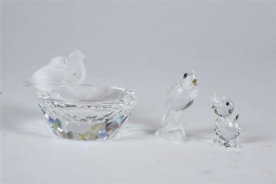 Appraisal: THREE SWAROVSKI CRYSTAL FIGURES Birds and birdbath h Parrot on