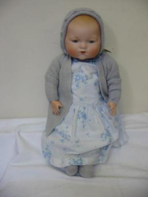 Appraisal: An Armand Marseille bisque head baby doll with blue glass