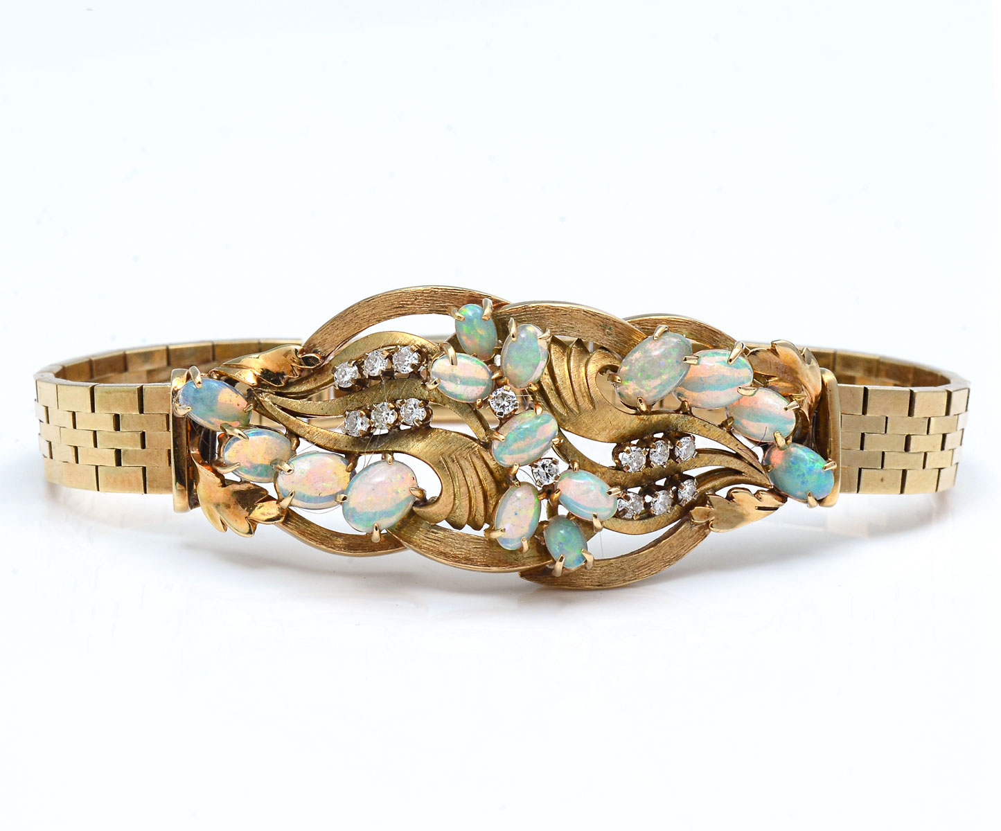 Appraisal: K OPAL DIAMOND BRACELET K yellow gold bracelet contains round