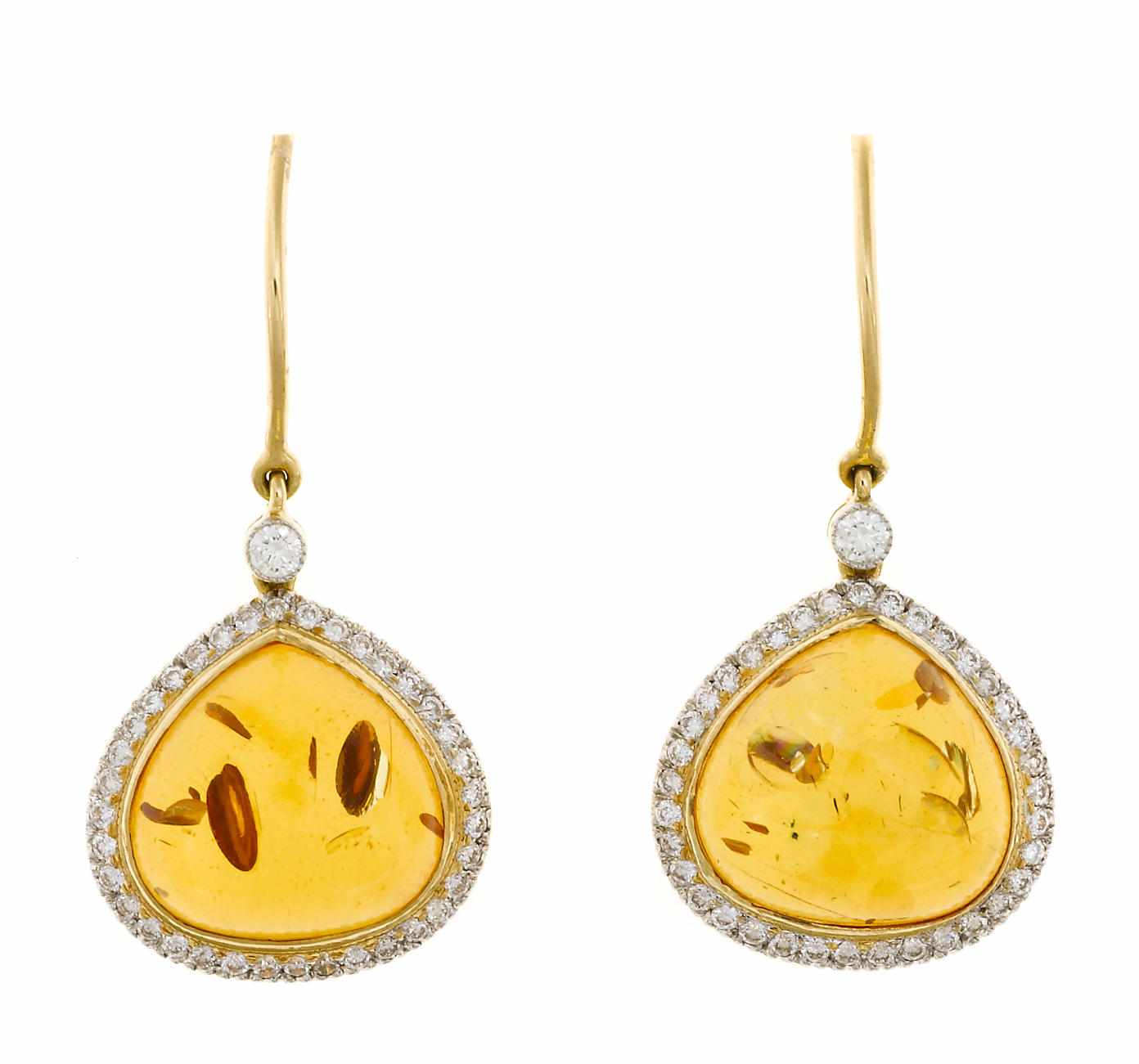 Appraisal: A pair of amber and diamond earrings modified pear-shaped amber