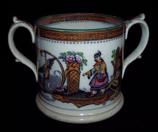 Appraisal: A th Century Staffordshire two-handled mug with transfer and lustre