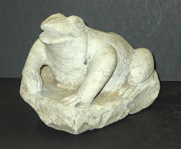 Appraisal: A carved stone model of a frog chipped length in