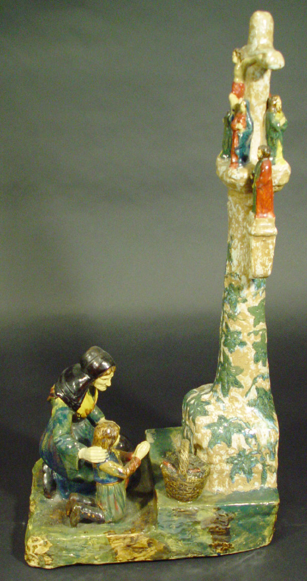 Appraisal: Large continental pottery religious figure group of a mother and