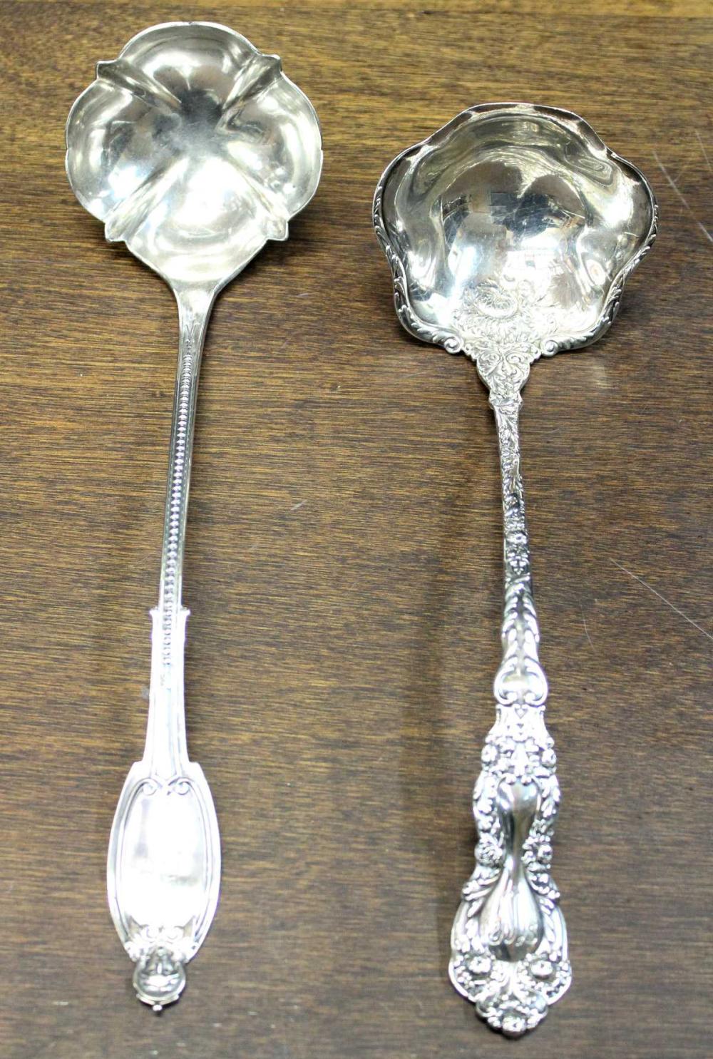 Appraisal: TWO SOLID SILVER SOUP LADLES including the Gorham sterling silver