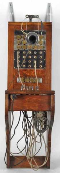 Appraisal: Wall Mount Switchboard Description Circa Oak with hanging transmitter and