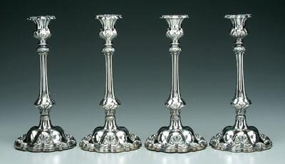 Appraisal: Four silver plated candlesticks round urn form sockets with acanthus