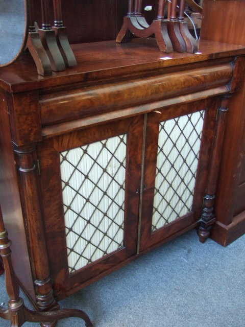 Appraisal: A th century mahogany side cabinet the single long cushion