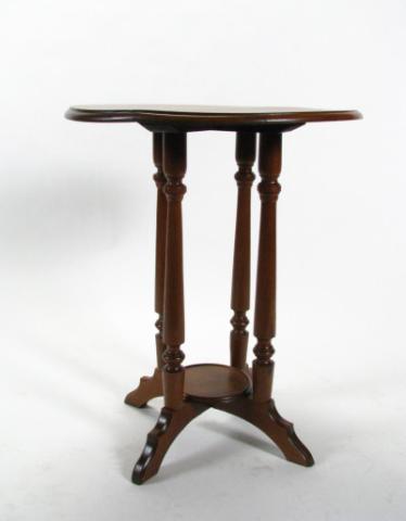 Appraisal: Antique four leg pedestal lamp table walnut '' diameter top