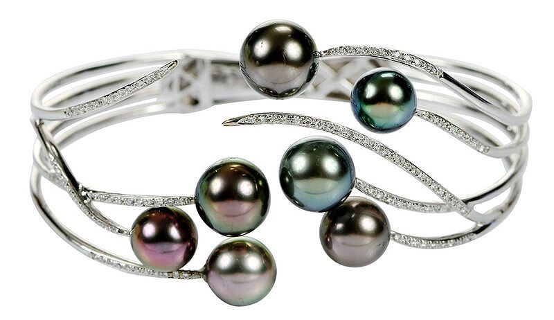 Appraisal: Mikimoto kt Pearl and Diamond Bracelet seven round Tahitian pearls