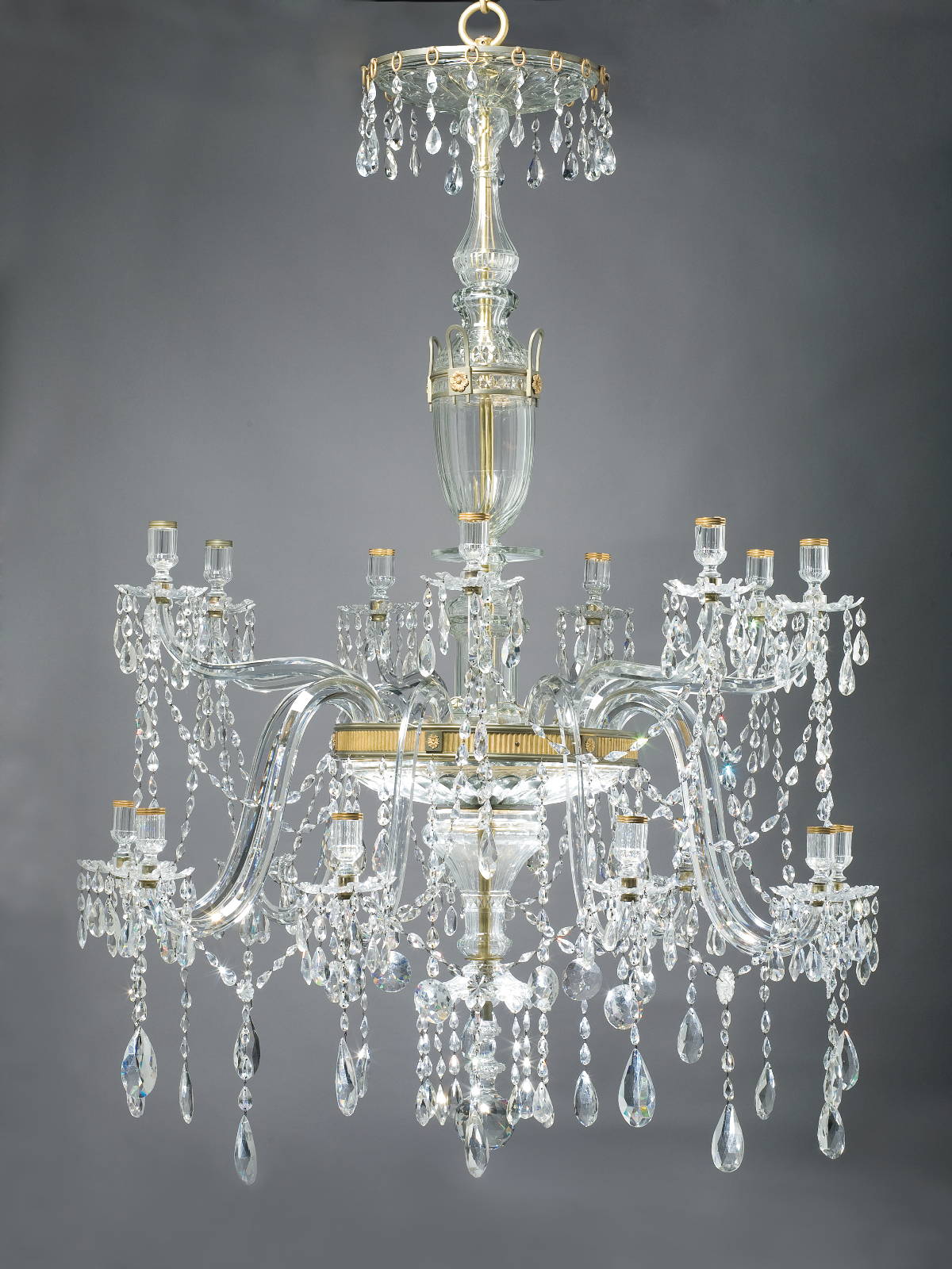 Appraisal: GEORGE III STYLE CUT-GLASS SEVENTEEN-LIGHT CHANDELIER The fluted corona hung