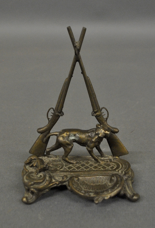 Appraisal: - Metal watch holder th c with hunting dog and