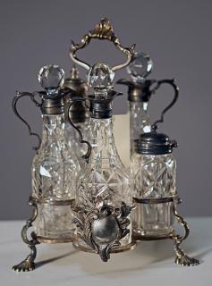 Appraisal: George III Sterling Castor and Victorian Bottles George III sterling