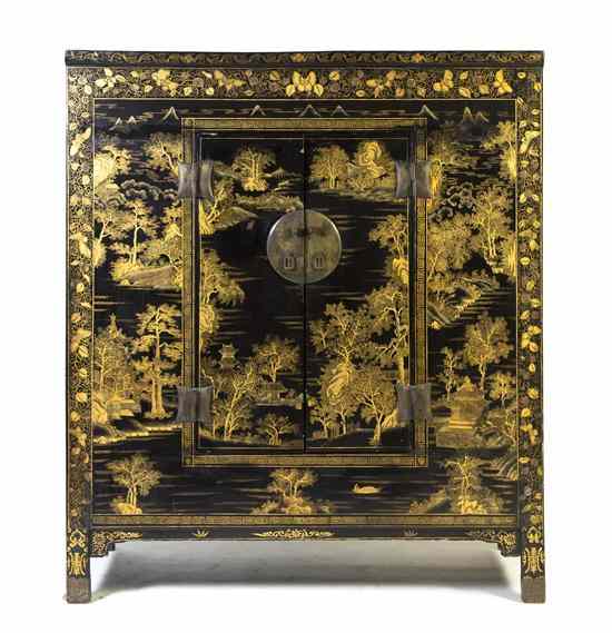 Appraisal: A Chinese Lacquered Cabinet of rectangular form having gilt landscape