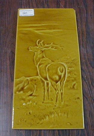 Appraisal: A yellow glazed picture tile - stag on a landscape