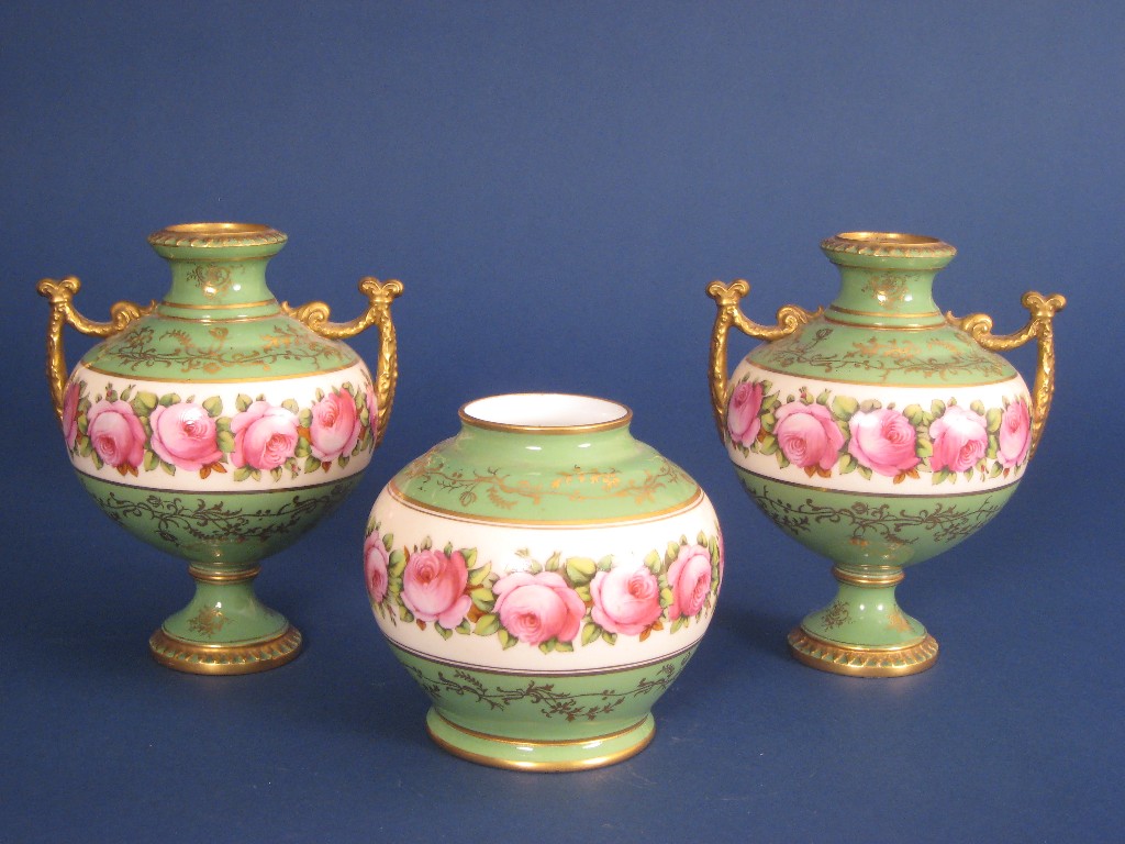 Appraisal: A Garniture of three Coalport Vases painted friezes of pink