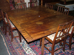 Appraisal: A mahogany drop leaf dining table th century the inlaid