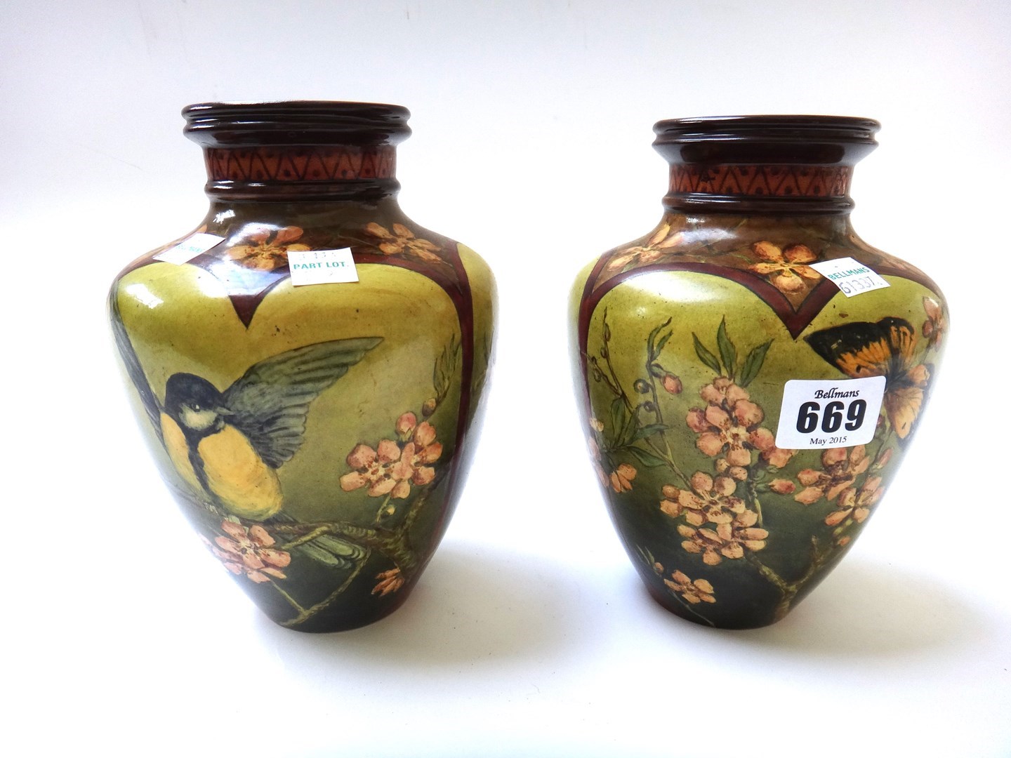 Appraisal: A pair of Doulton Lamberth Faience stoneware vases late th