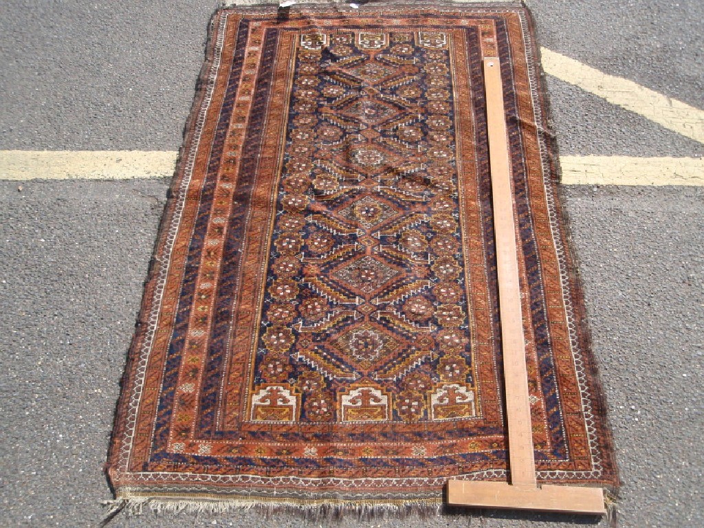 Appraisal: A Turkish design rug with six medallion centre field and