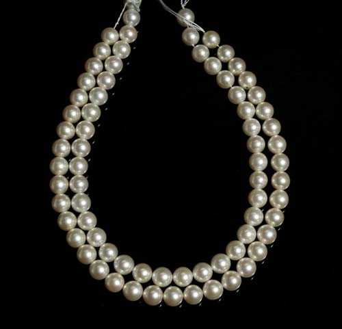 Appraisal: TWO STRINGS OF PEARLS Each with Akoya cultured pearls of