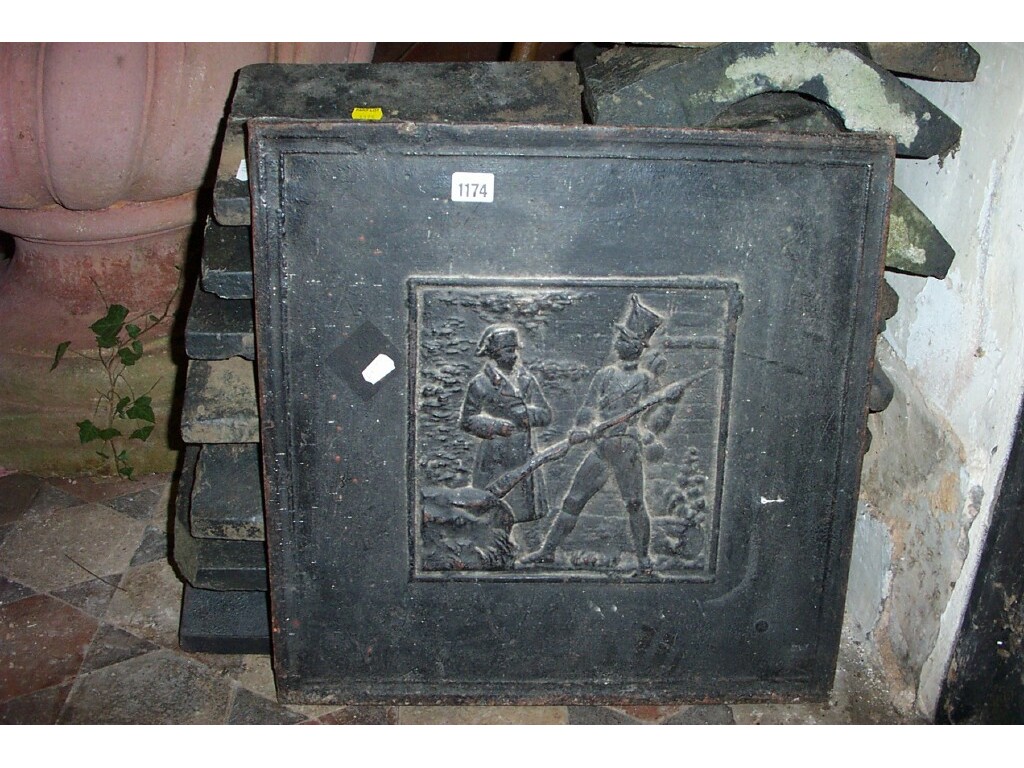 Appraisal: A th century cast iron fire back showing Napoleon and