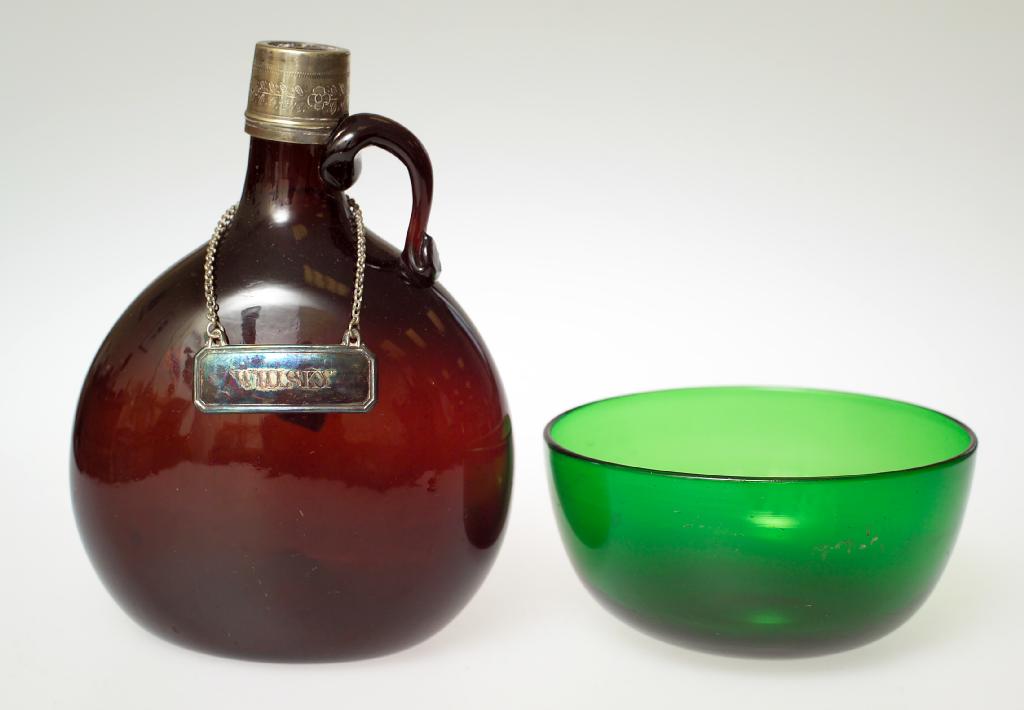 Appraisal: AMBER GLASS WINE FLAGON mid- th century with silver-plated collar