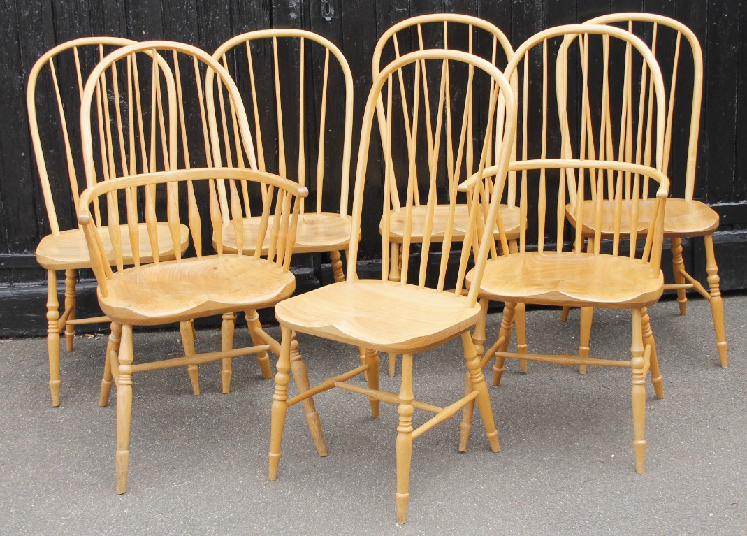 Appraisal: A set of seven spindle back hoop chairs with shaped