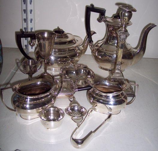 Appraisal: A four-piece service of oval form comprising coffee pot teapot