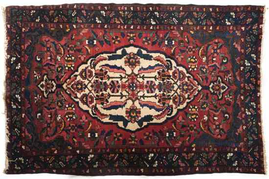 Appraisal: A Heriz Wool Rug having a stylized foliate center medallion