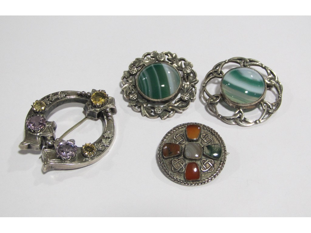 Appraisal: Lot comprising Victorian silver gem set pennanular brooch and three