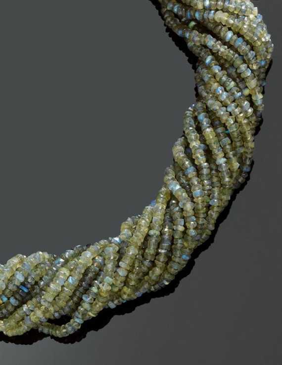 Appraisal: LABRADORITE SAUTOIR Fastener in yellow gold Casual-elegant row sautoir torsade