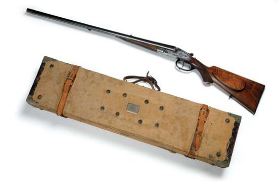 Appraisal: CASED DOUBLE-BARREL SHOTGUN Germany th century Marked on the locks