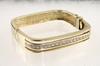 Appraisal: BRACELET - One K yellow gold and diamond hinged rectangular