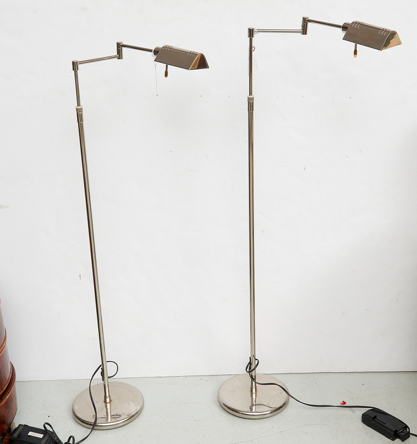 Appraisal: PAIR HOLTKOTTER LEUCHTEN SWING ARM FLOOR LAMPS th c chrome