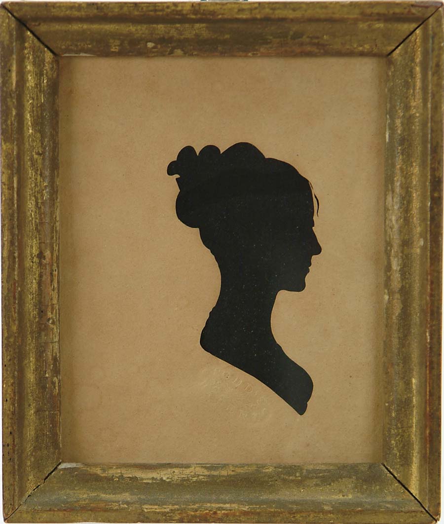 Appraisal: FRAMED HOLLOW CUT SILHOUETTE OF A WOMAN Paper with impressed