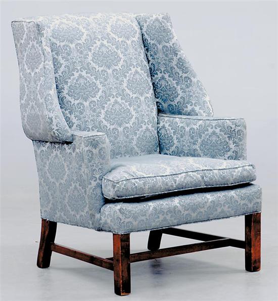 Appraisal: American Chippendale style wing-back chair padded back issuing outscrolled wings