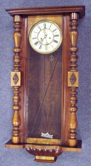 Appraisal: A Victorian regulator the mahogany case with turned columns flanking