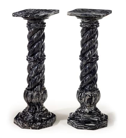 Appraisal: Pair of black and white marble pedestals The square top