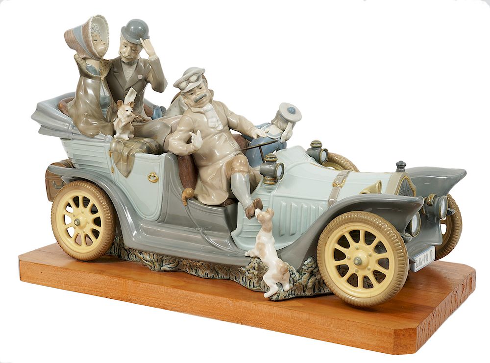 Appraisal: Lladro Porcelain Touring Family Car Lladro porcelain open touring car