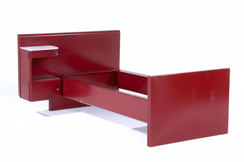 Appraisal: JEAN PROUVE Red enameled metal single bed integrated with a