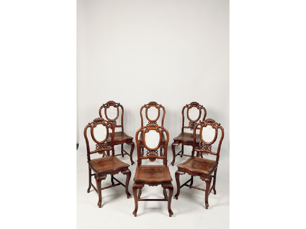 Appraisal: A SET OF SIX CHINESE HARDWOOD DINING CHAIRS with scrolling