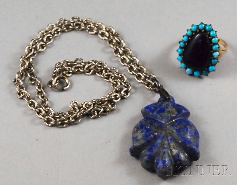 Appraisal: Two Lapis Lazuli Jewelry Items a carved pendant on chain