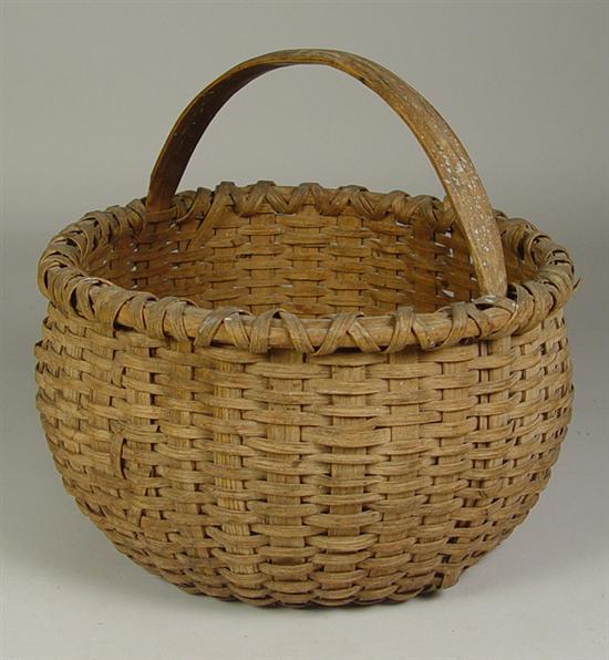 Appraisal: Oak Splint Basket Circa or later Wrapped rim Melon shape