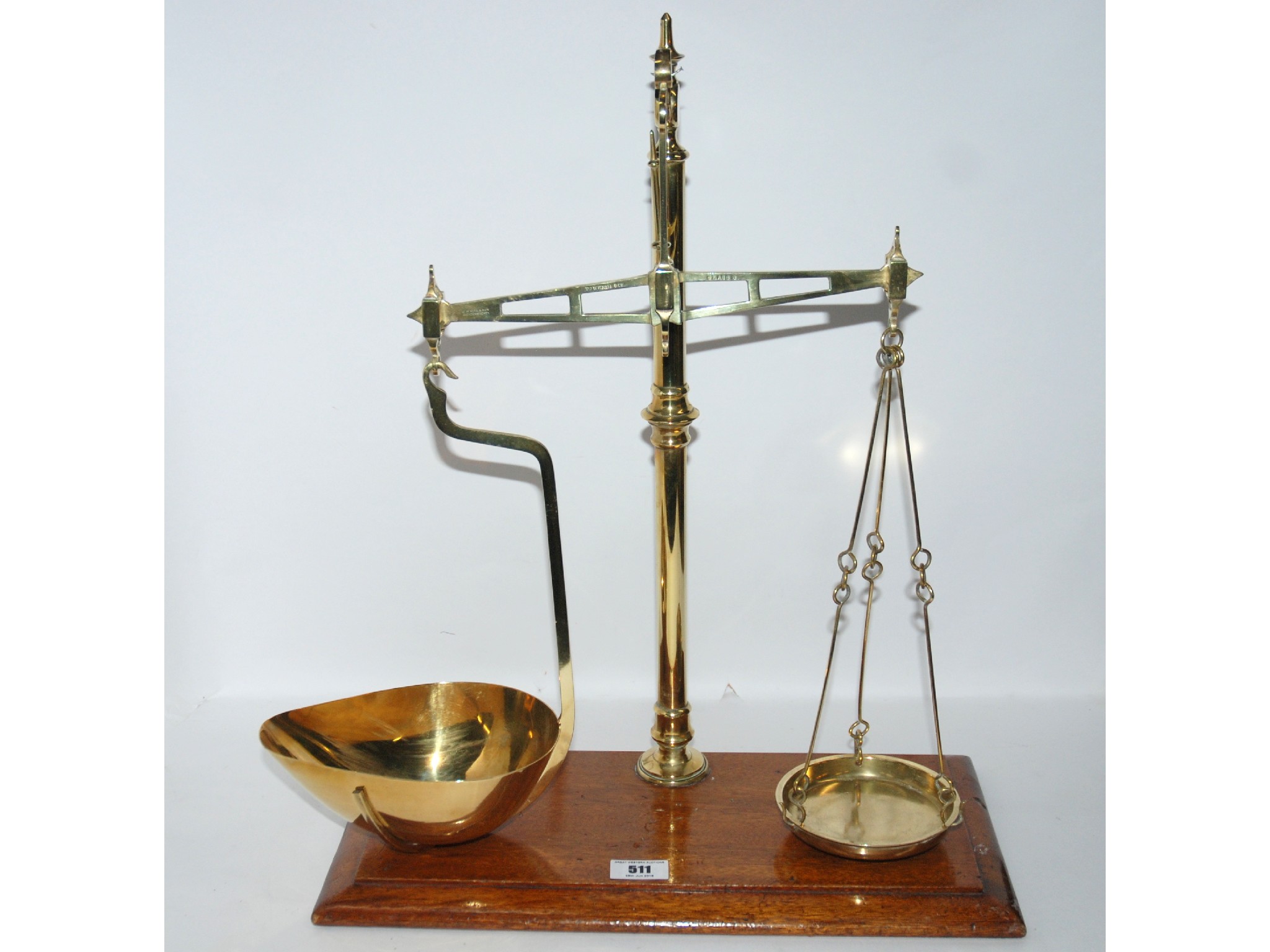 Appraisal: A set of brass scales by J White Sons with