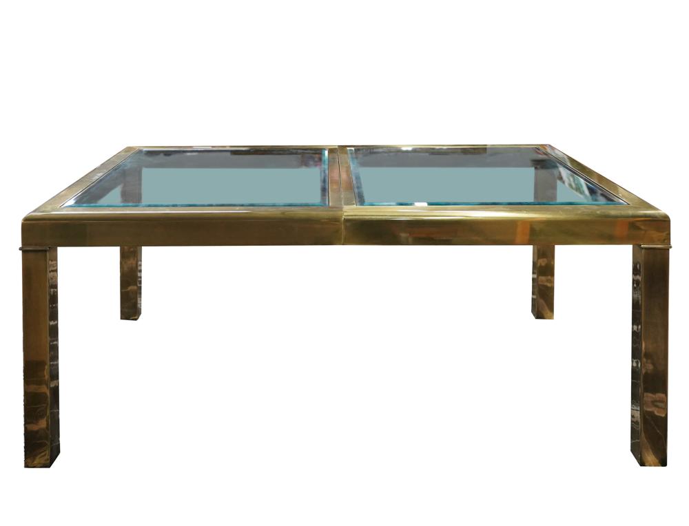 Appraisal: BRASS GLASS EXTENDING DINING TABLEunsigned the inset glass panels with